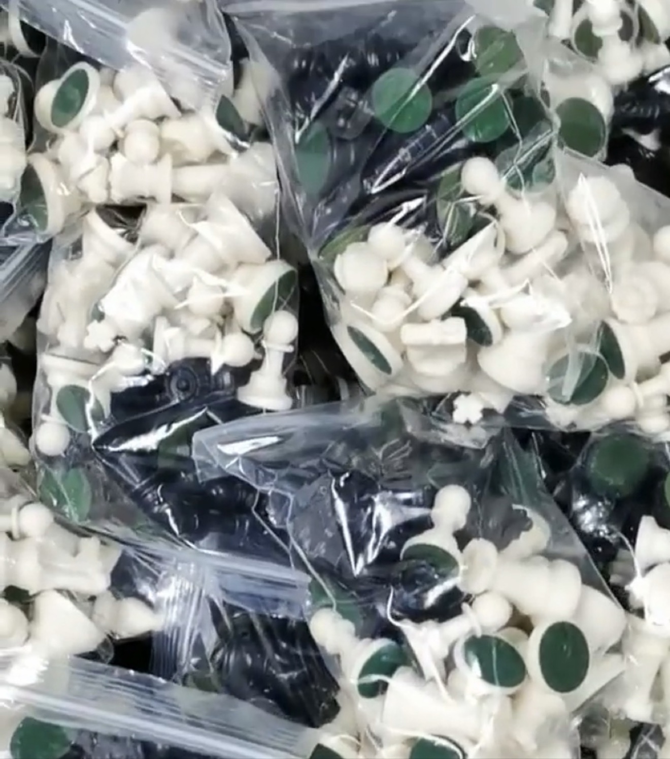 Bagged black and white chess pieces